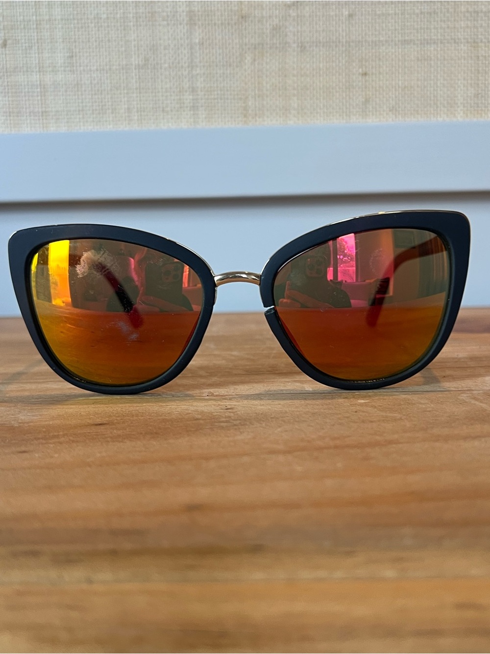Stylish Black Frame Sunglasses with Orange Mirrored Lenses